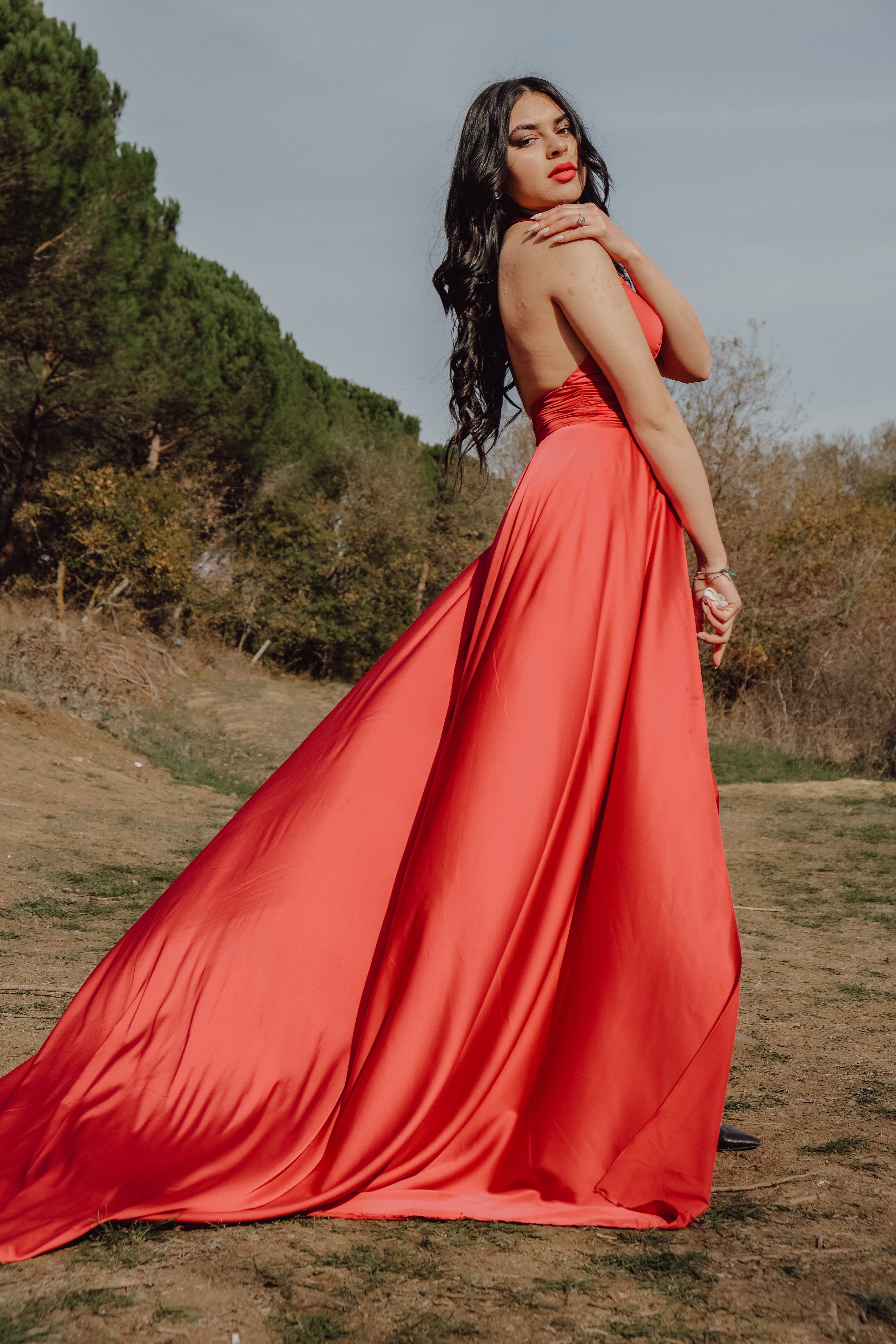 Woman Posing in Black Dress on a Beach · Free Stock Photo