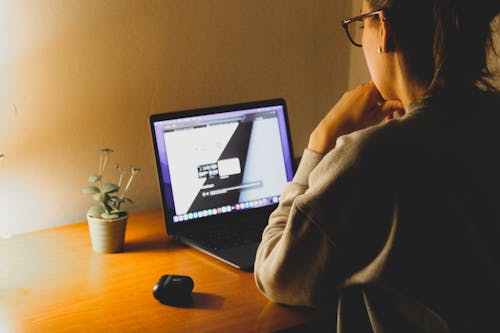 A Woman Working on a Laptop