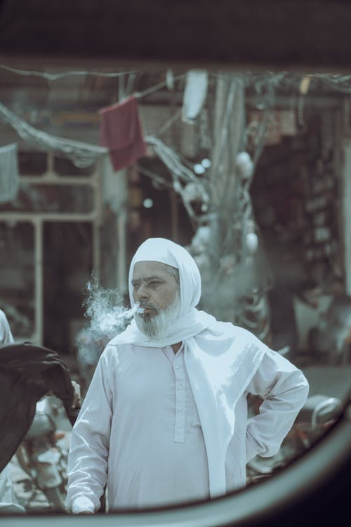 Man in Turban Smoking Cigarette