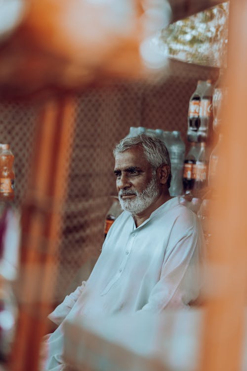 Elderly Man in White Clothes