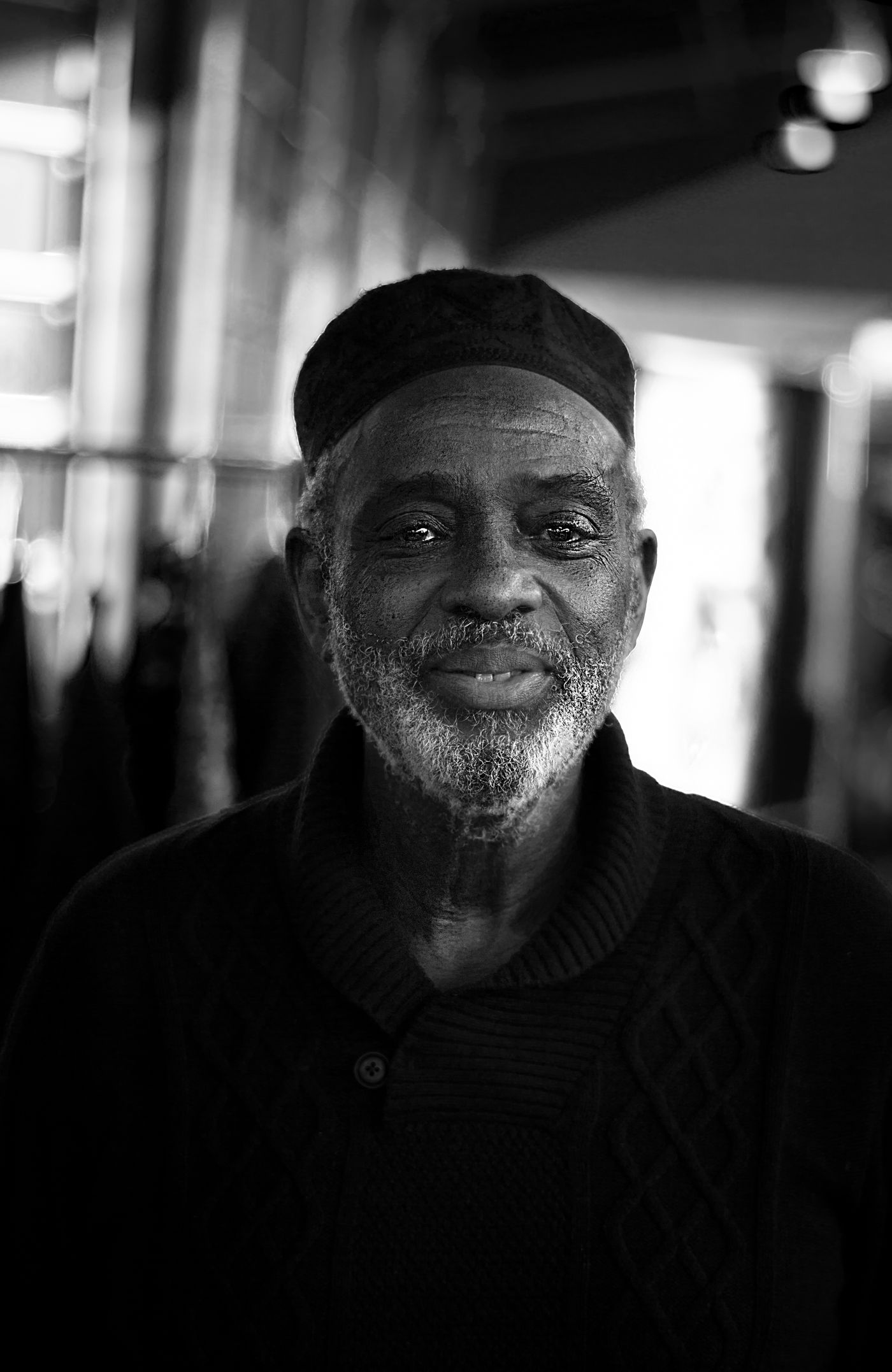Dignified senior African man in a softly lit portrait