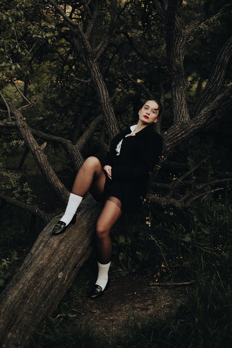 Woman Lying On A Tree 