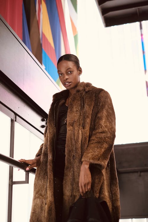 Young Elegant Woman Wearing a Fur Coat 