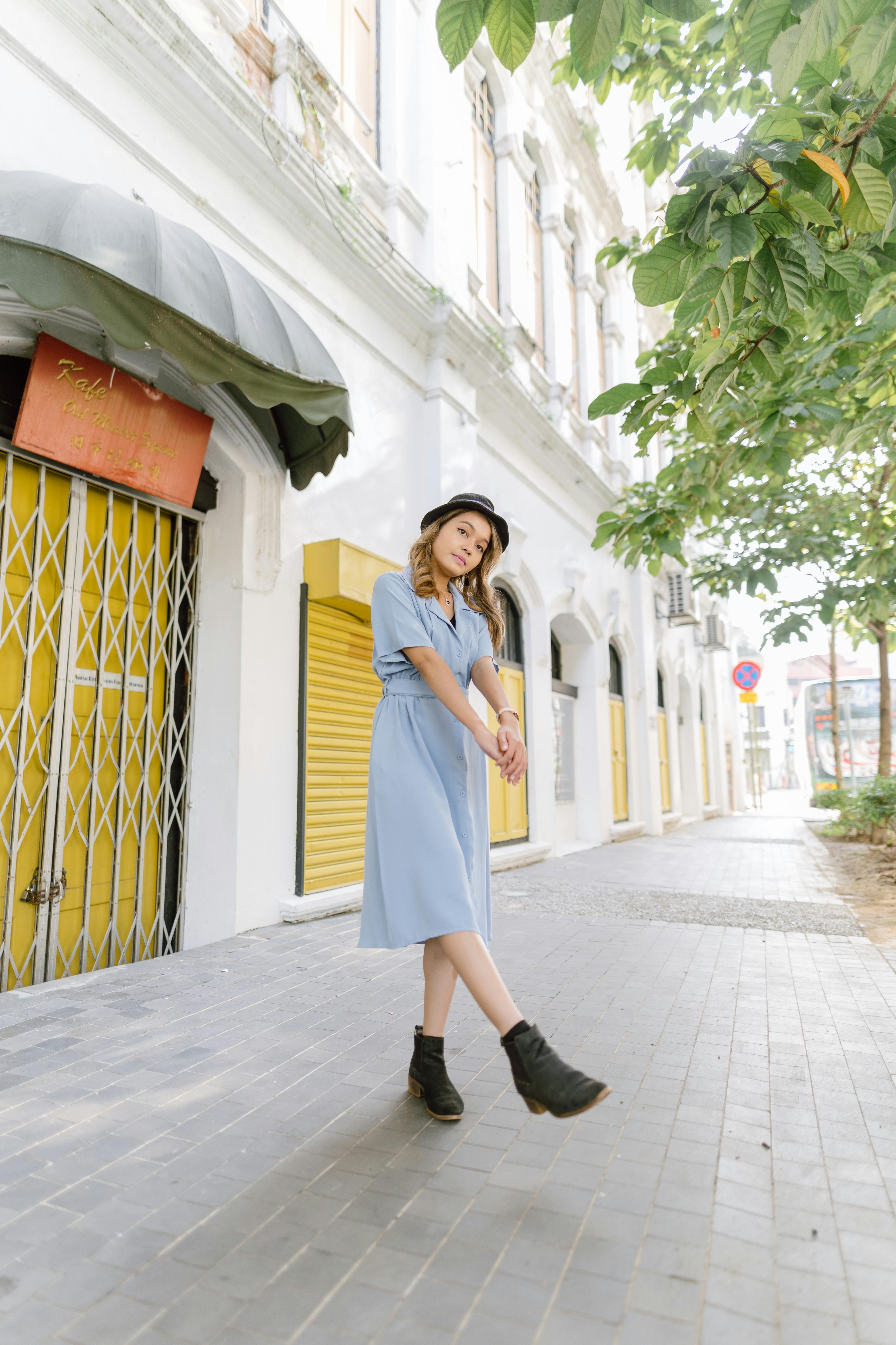 Young Woman in Stylish Dress Walking Down the Street Alone. Editorial Photo  - Image of lifestyle, fashion: 178437616