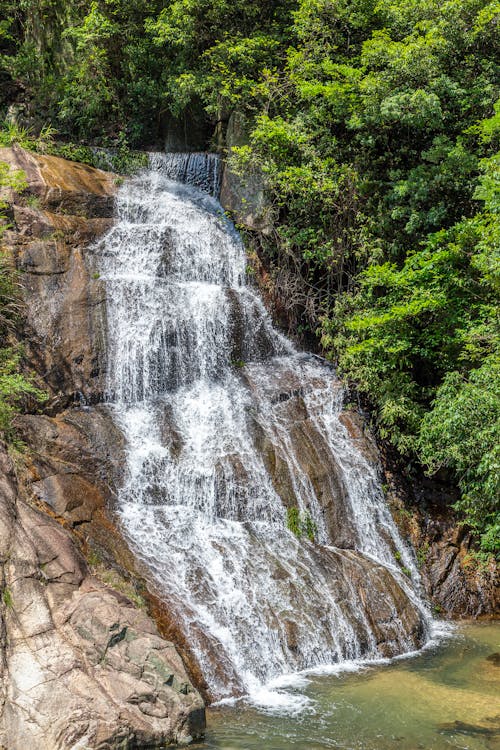 Water Flowing Down the Cliff in Mountains 