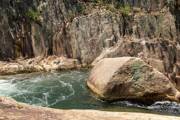 A Creek Between Rocky Cliffs 