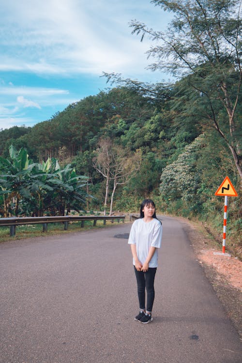 Woman Wearing White Crew-neck Shirt