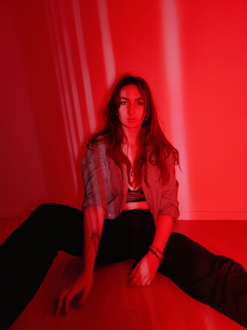 A Portrait of a Woman in Red Light