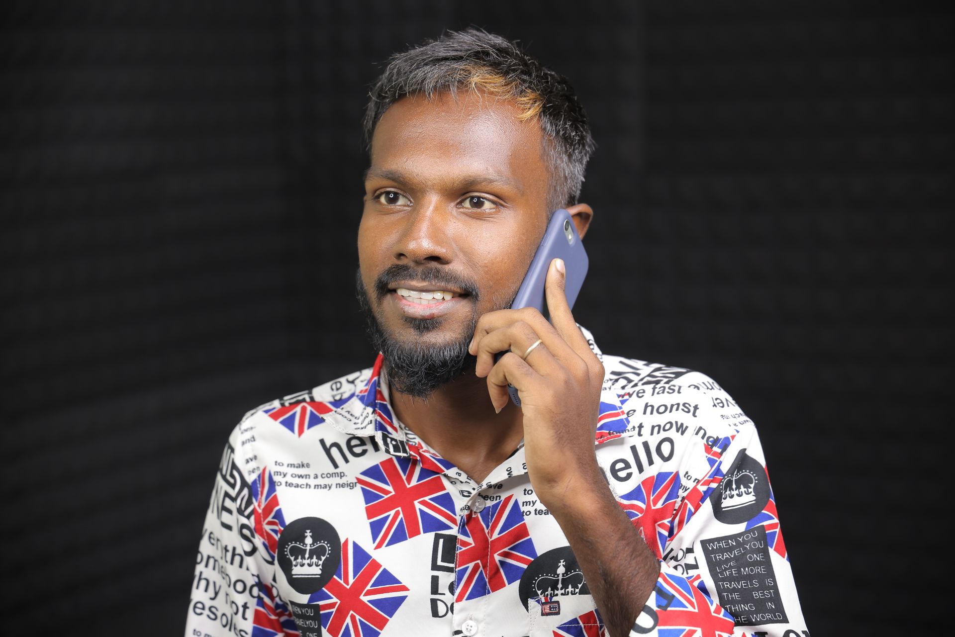 Indian Man Talking on a Phone