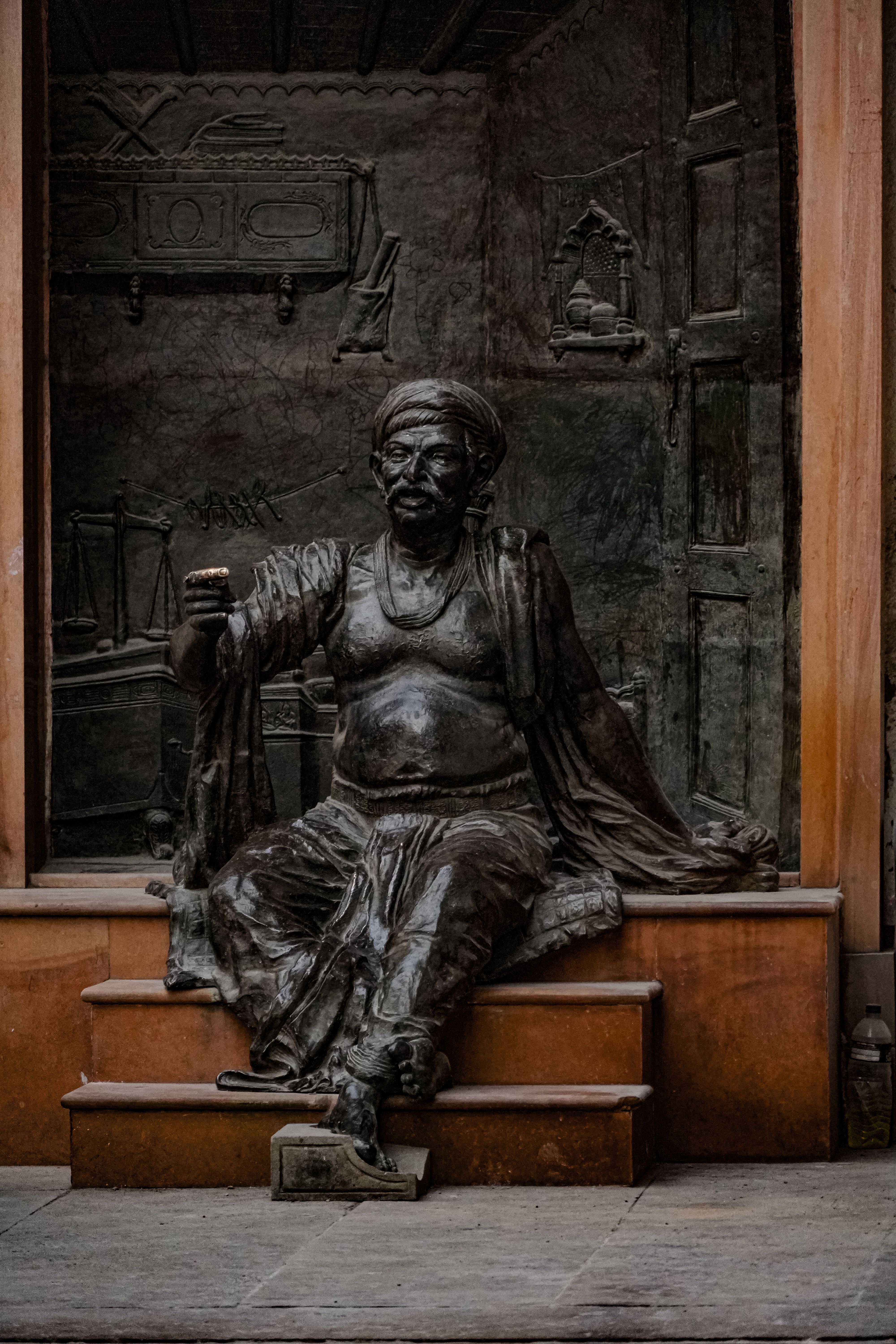Bronze sculpture of a historic figure in Ahmedabad, India, showcasing intricate artistry.