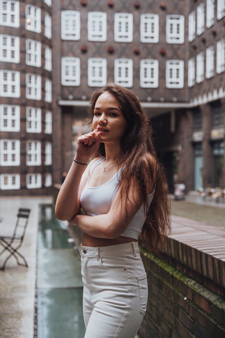 Young Woman In The Inner Courtyard Of The Sprinkenhof Building