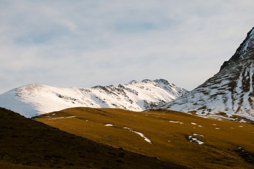 Free Scenic view of snowcapped mountains in Bagnères-de-Bigorre, Occitanie during winter. Stock Photo
