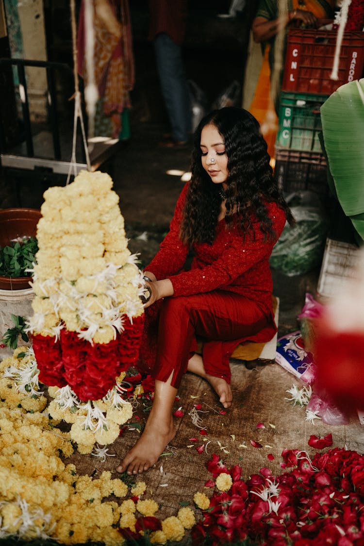 Woman Sitting With Decorations