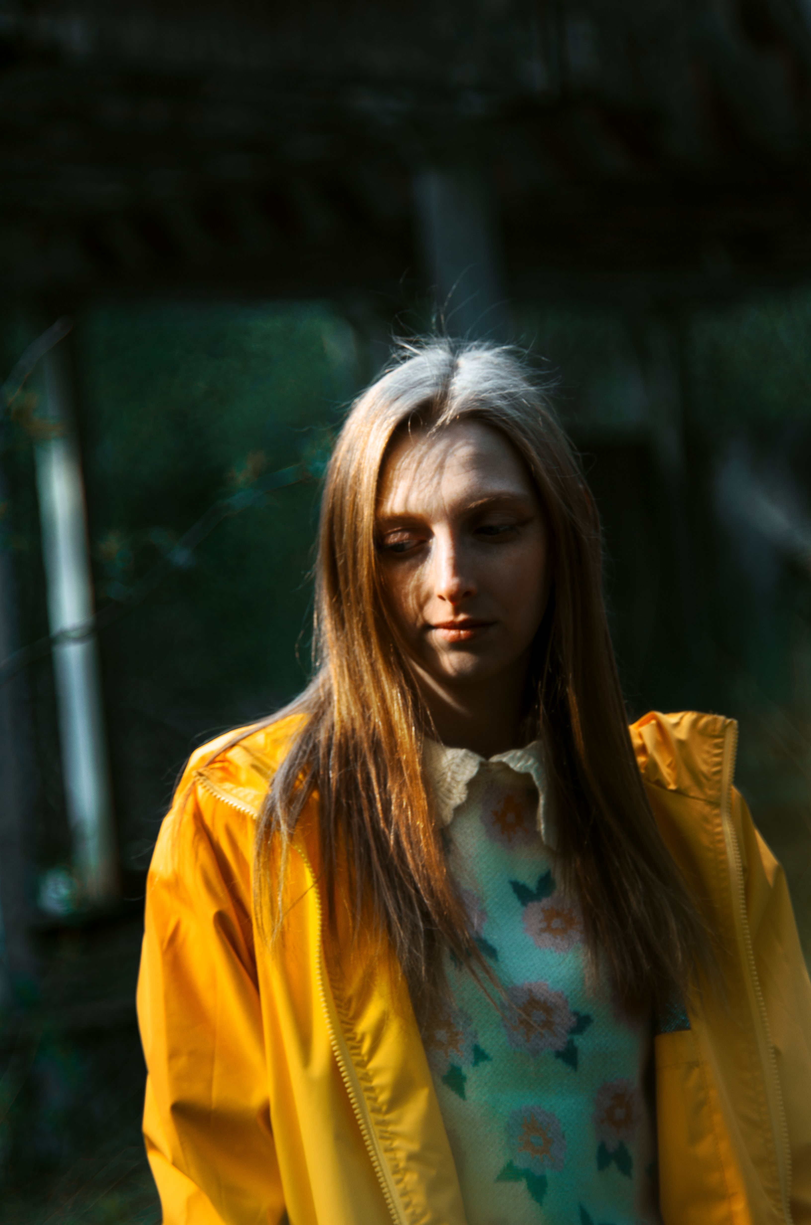 Woman Posing in Yellow Jacket · Free Stock Photo