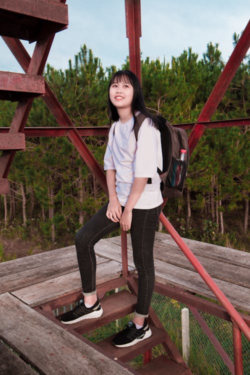 Free Woman Standing on Stairs Stock Photo