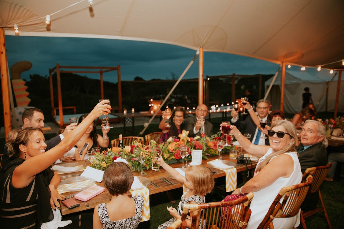 People Sitting Beside Table