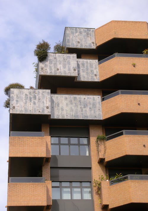 Facade of a Modern Apartment Building with Balconies in City 
