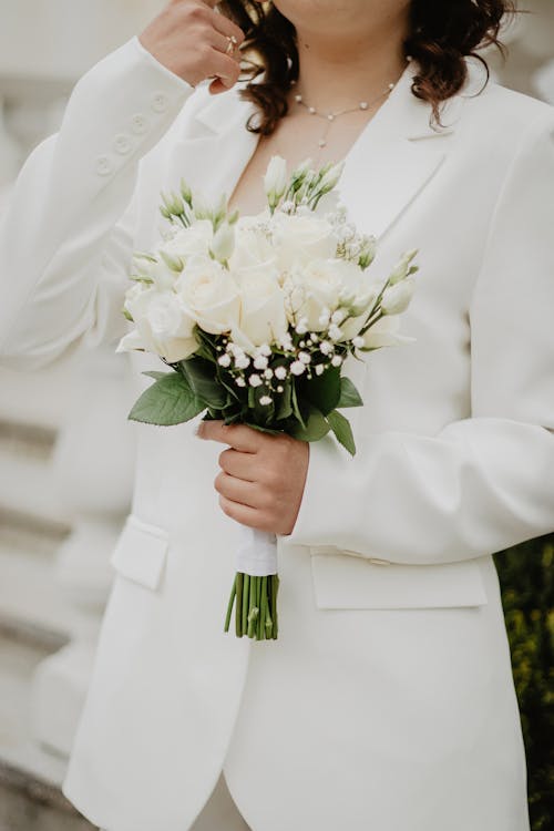 A Woman Holding a Bouquet 