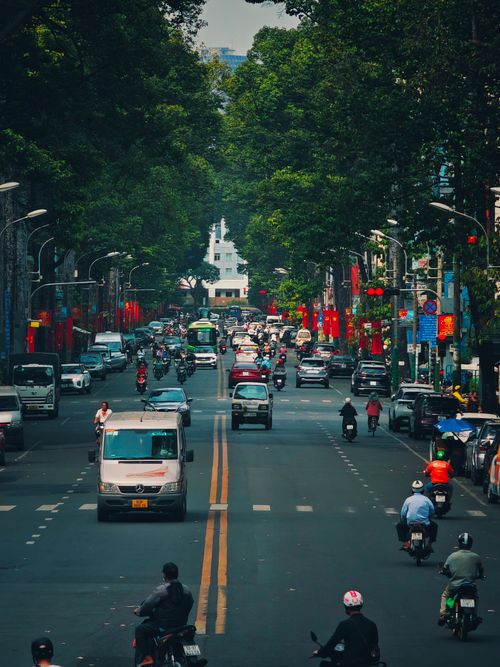 Free Vibrant urban scene capturing rush hour traffic in Ho Chi Minh City, Vietnam. Stock Photo