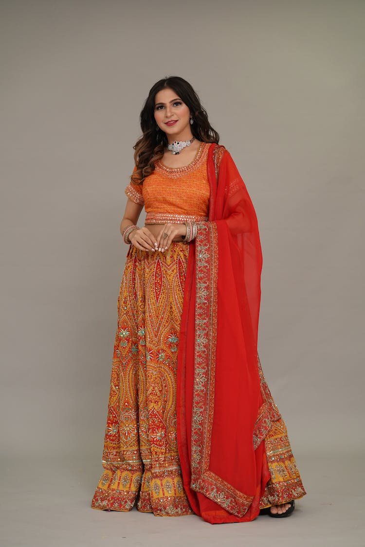 Young Woman In Traditional Indian Dress In Studio