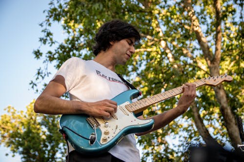 Man Playing Electric Guitar