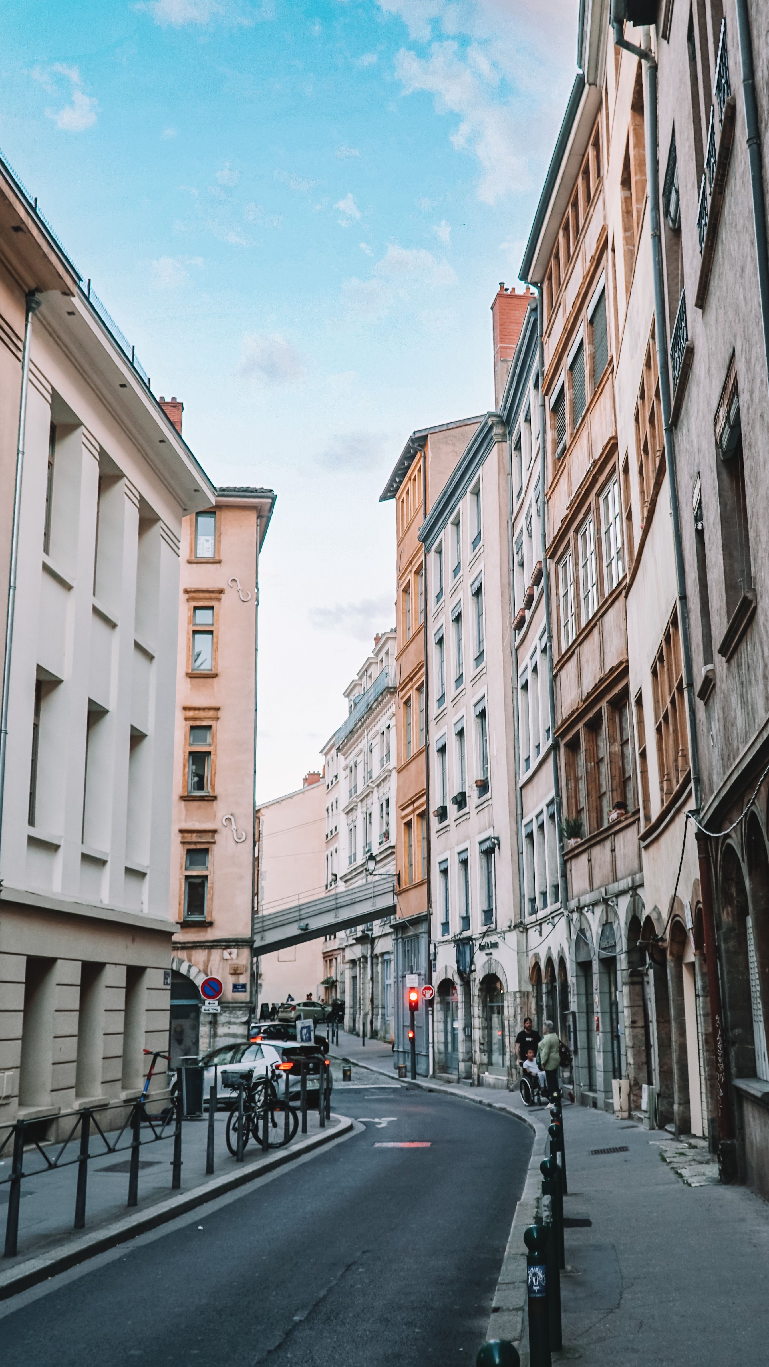 A Narrow Street between Residential Buildings in City · Free Stock Photo