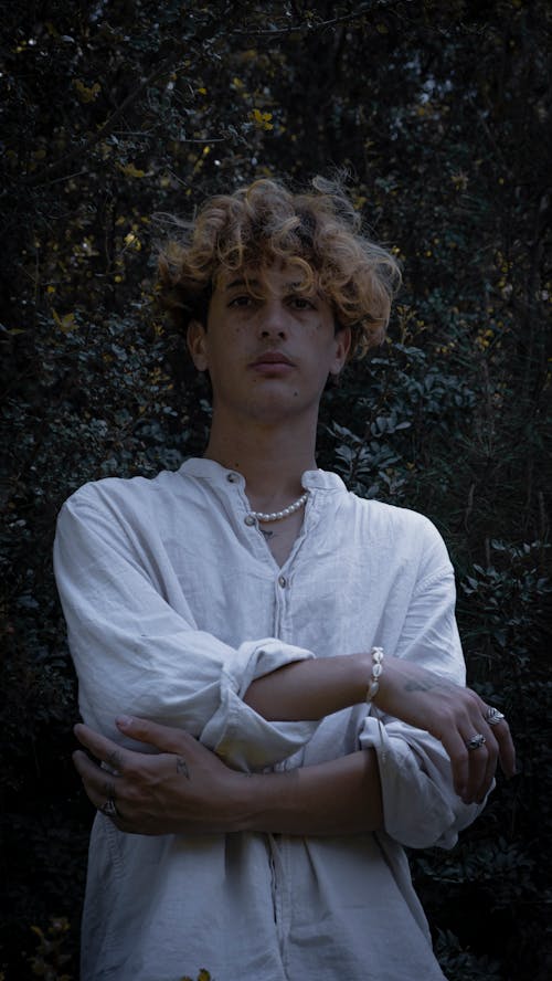 Blonde Man Posing in White Shirt