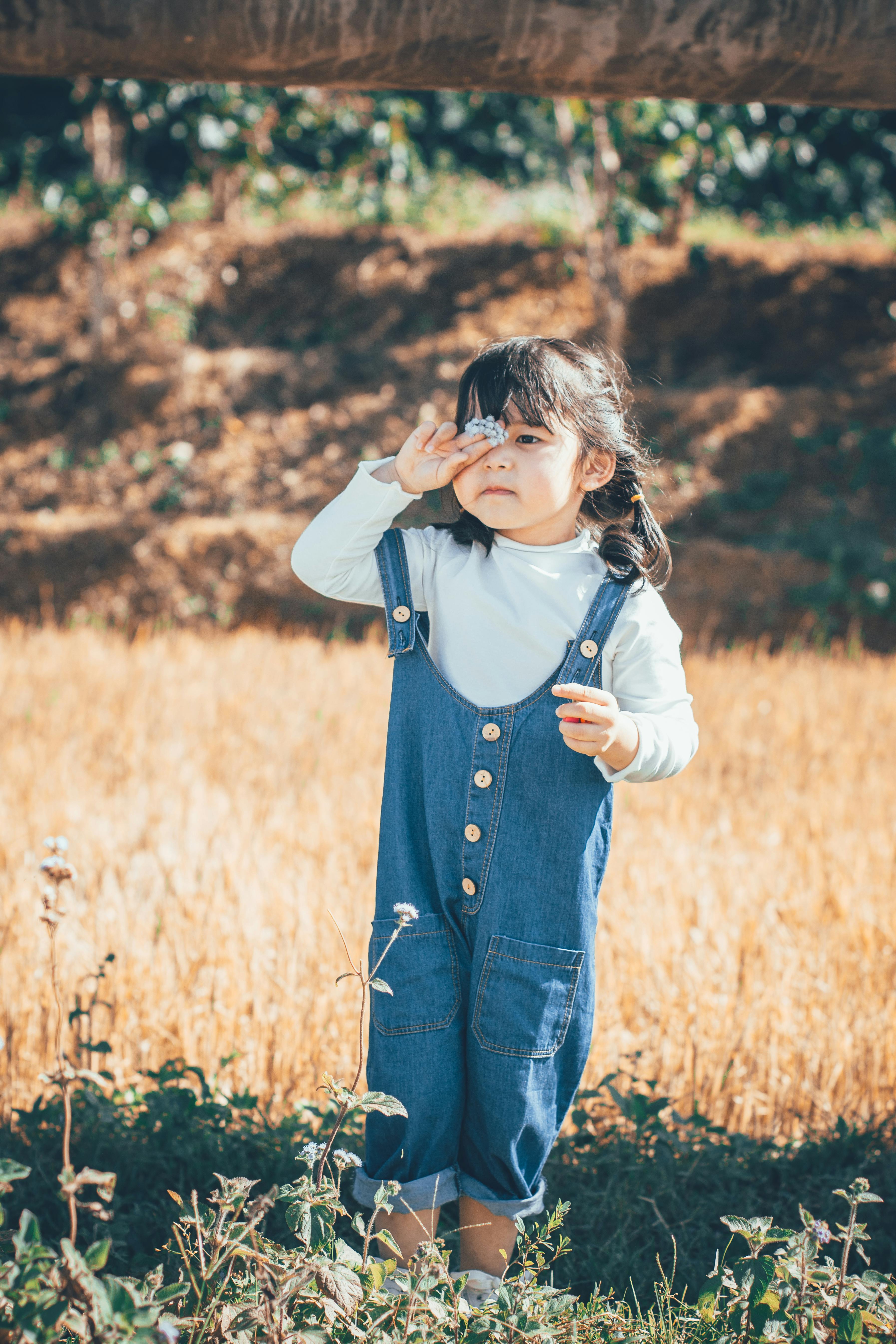 Girl Holding White Accessory