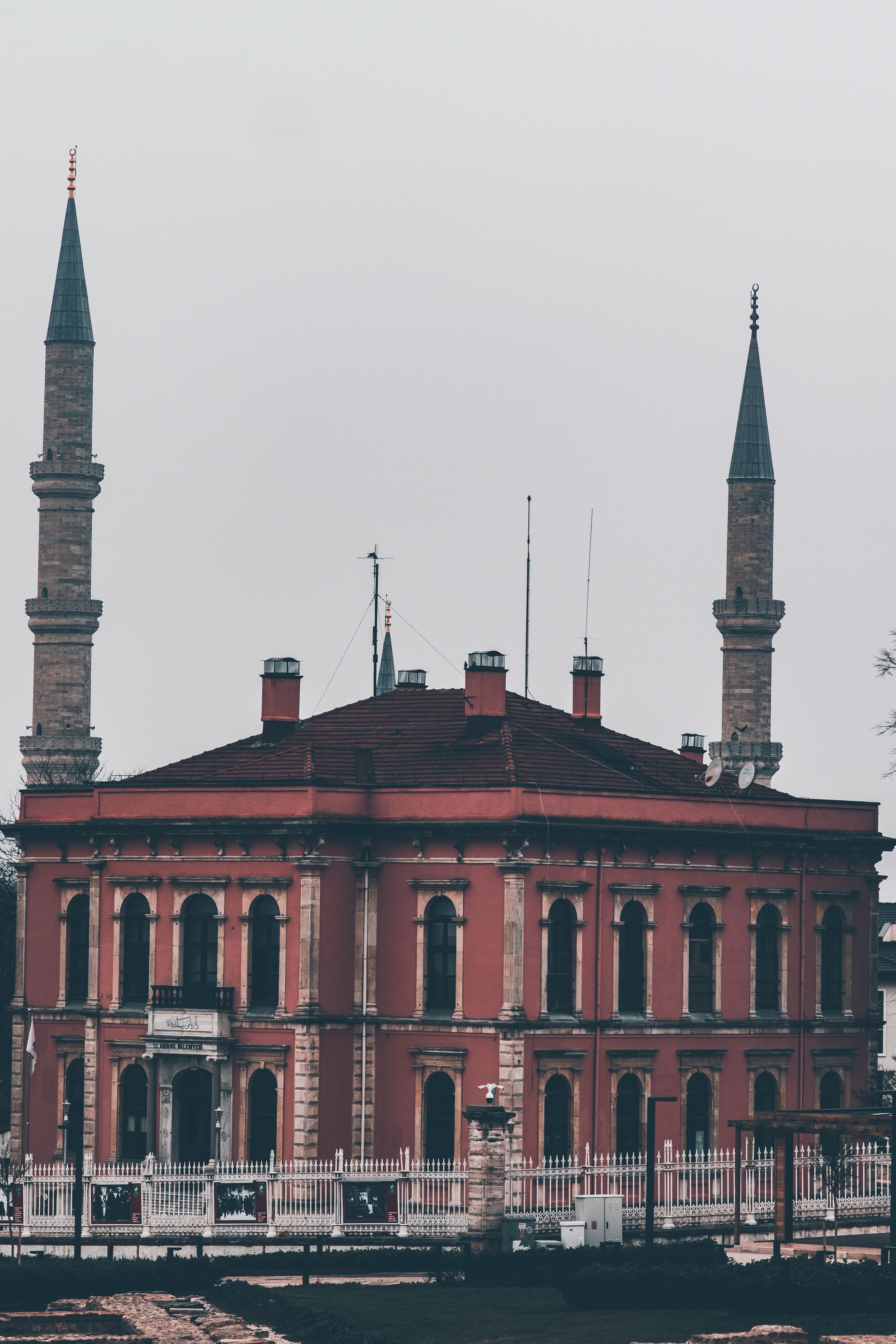 Stunning view of a historic mosque with tall minarets in Edirne, Turkey. Architectural beauty captured in a vertical shot.
