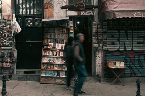 Free A bustling urban street with a bookstore facade in Istanbul, Turkey. Stock Photo