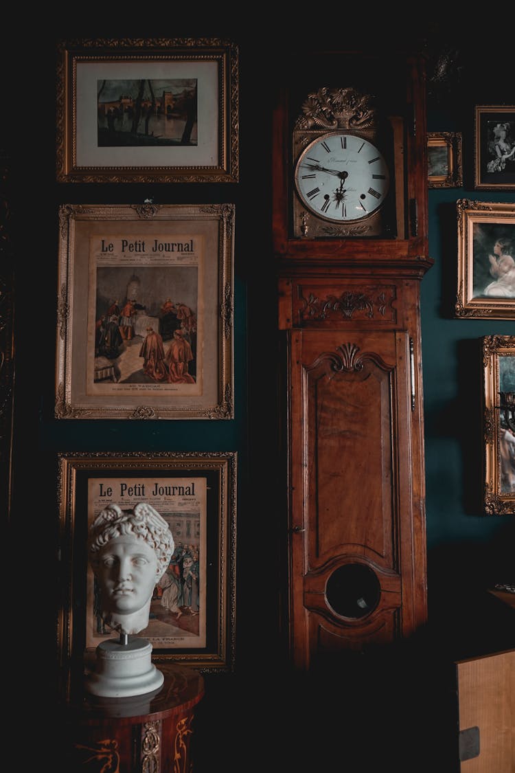 Bust Near Wall With Vintage Clock