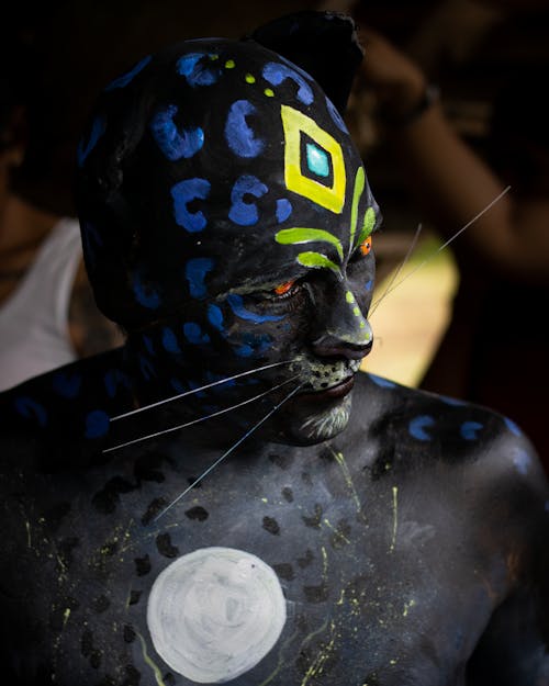 Man in Cat Costume with Black Skin