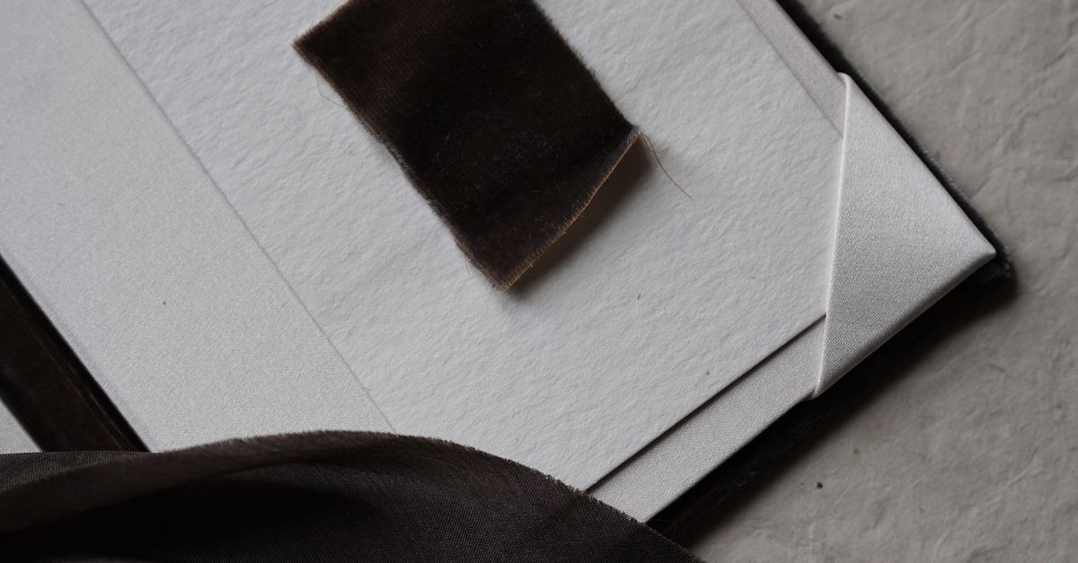 A Booklet and a Ribbon · Free Stock Photo