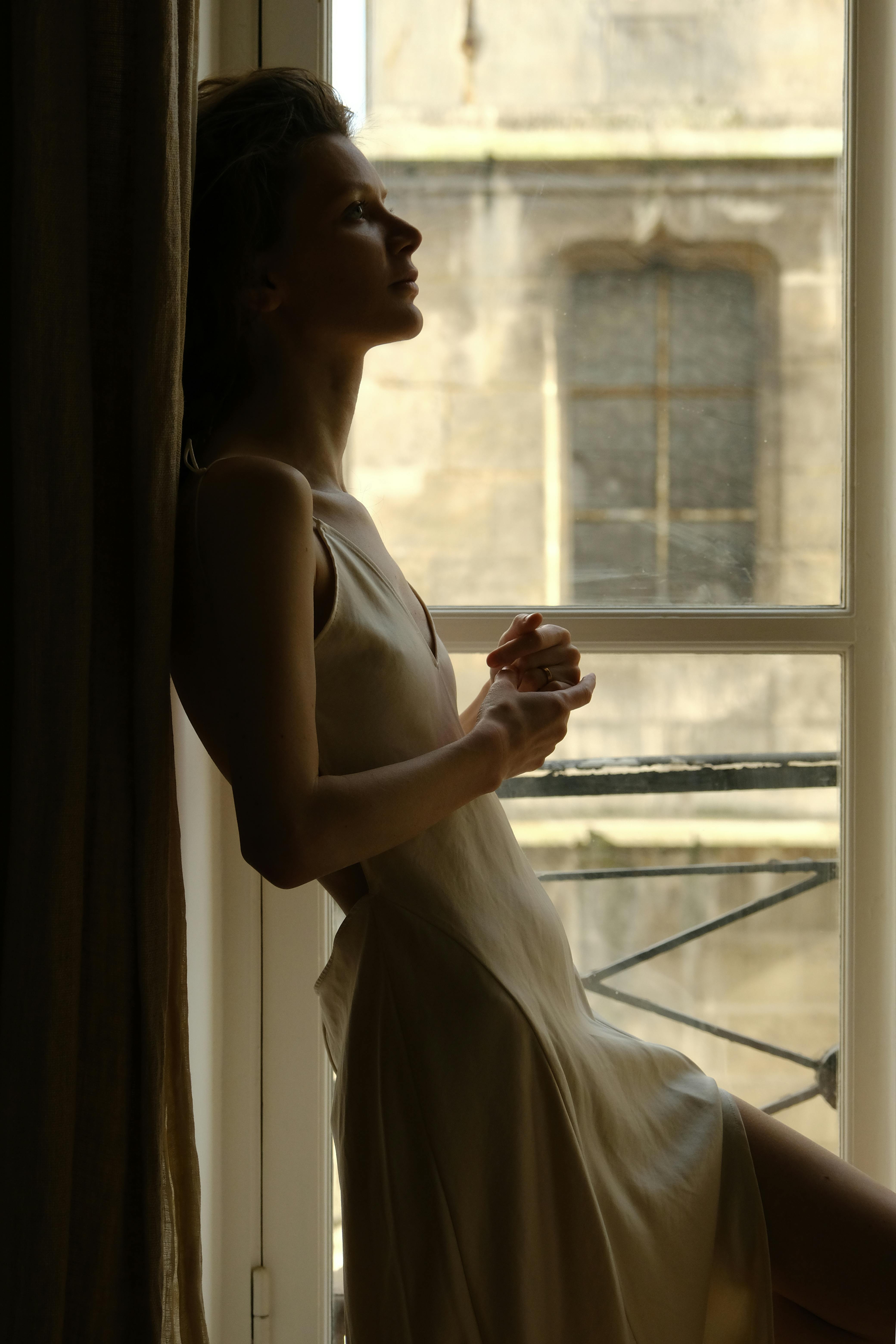 HD wallpaper: woman standing near white window, woman wearing