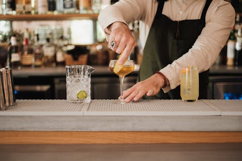 A Bartender Preparing a Cocktail 