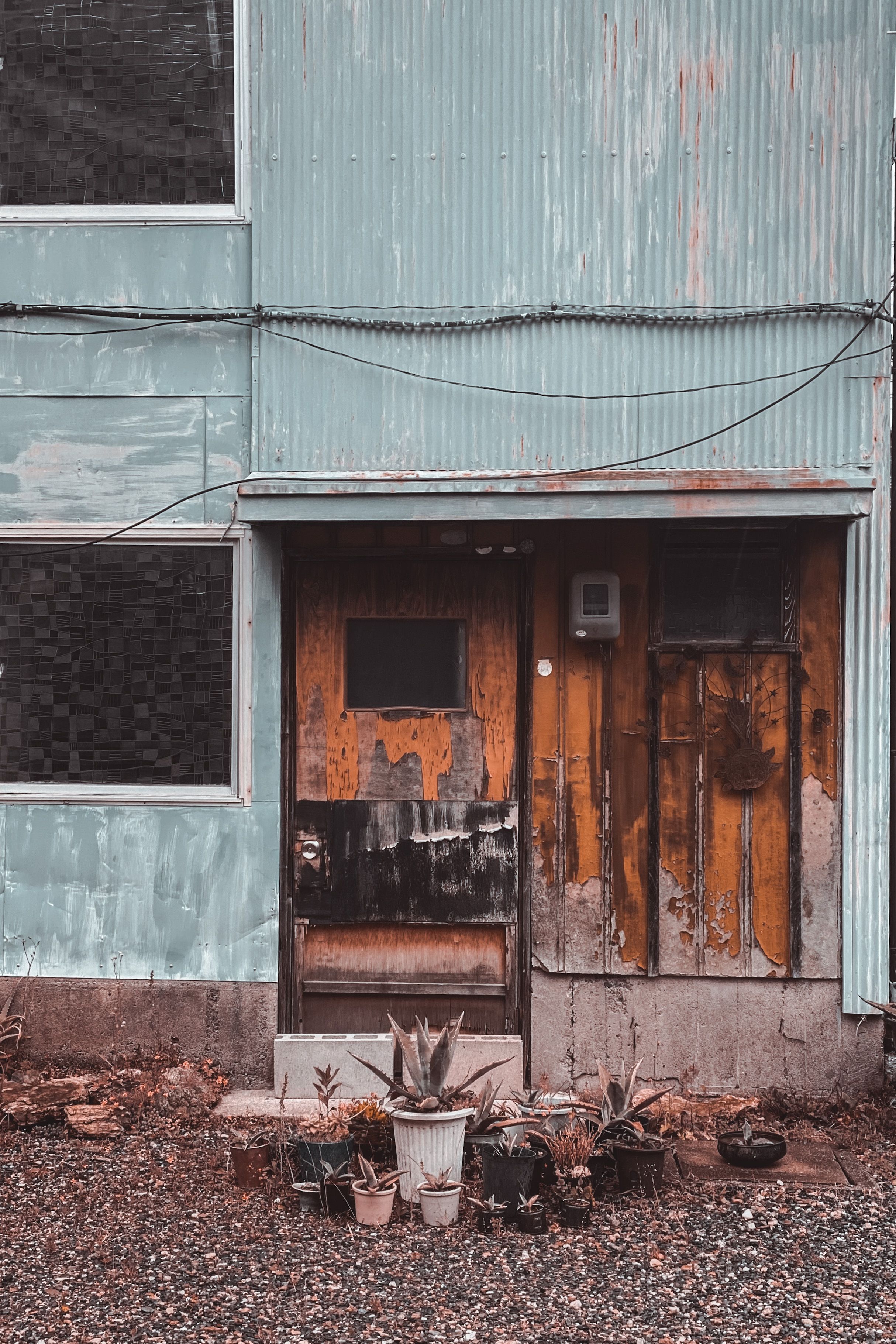 Weathered vacant Japanese building -- typical exterior condition of many akiya properties