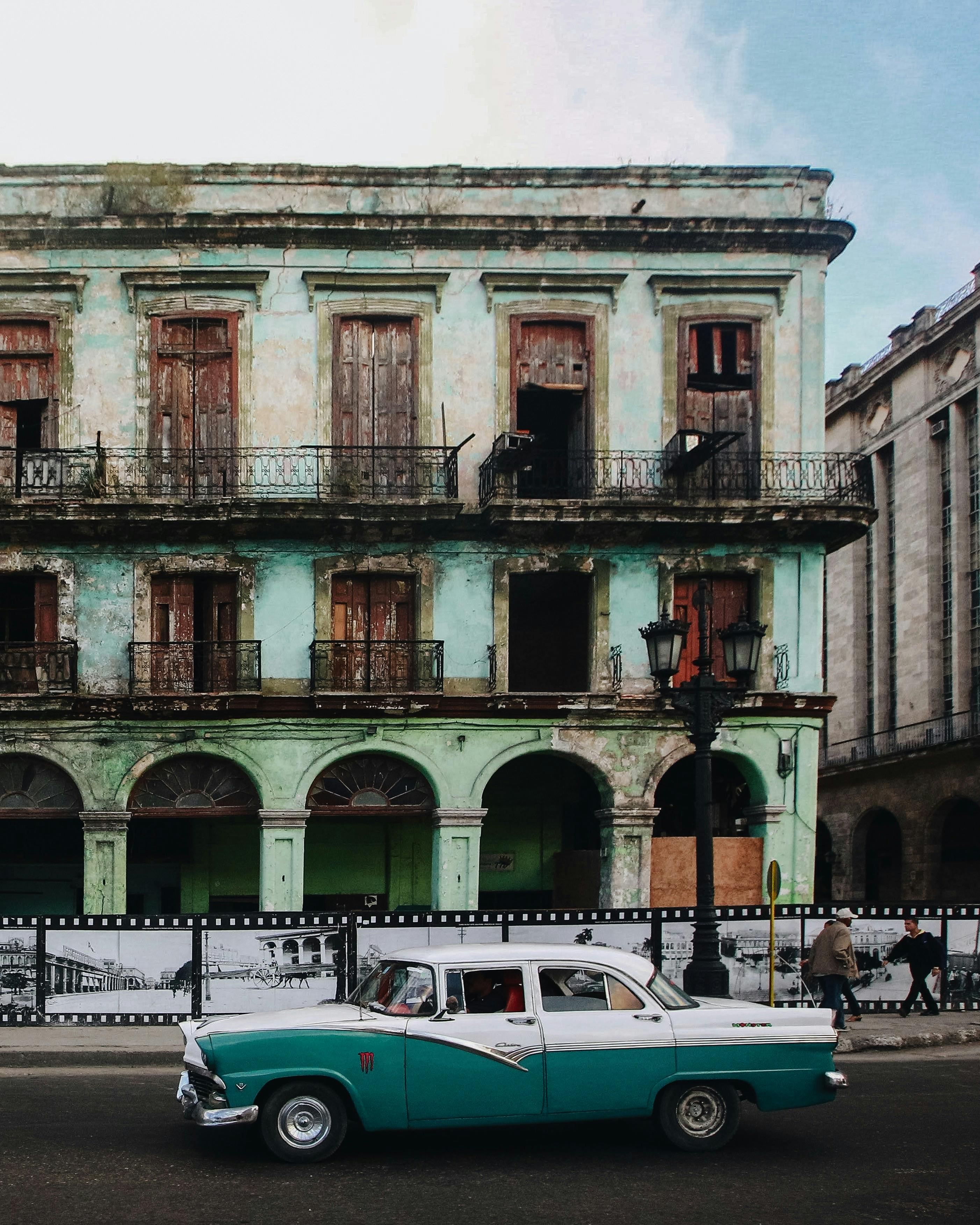 A Chevrolet 210 in front of an Abandoned Building in Havana, Cuba 