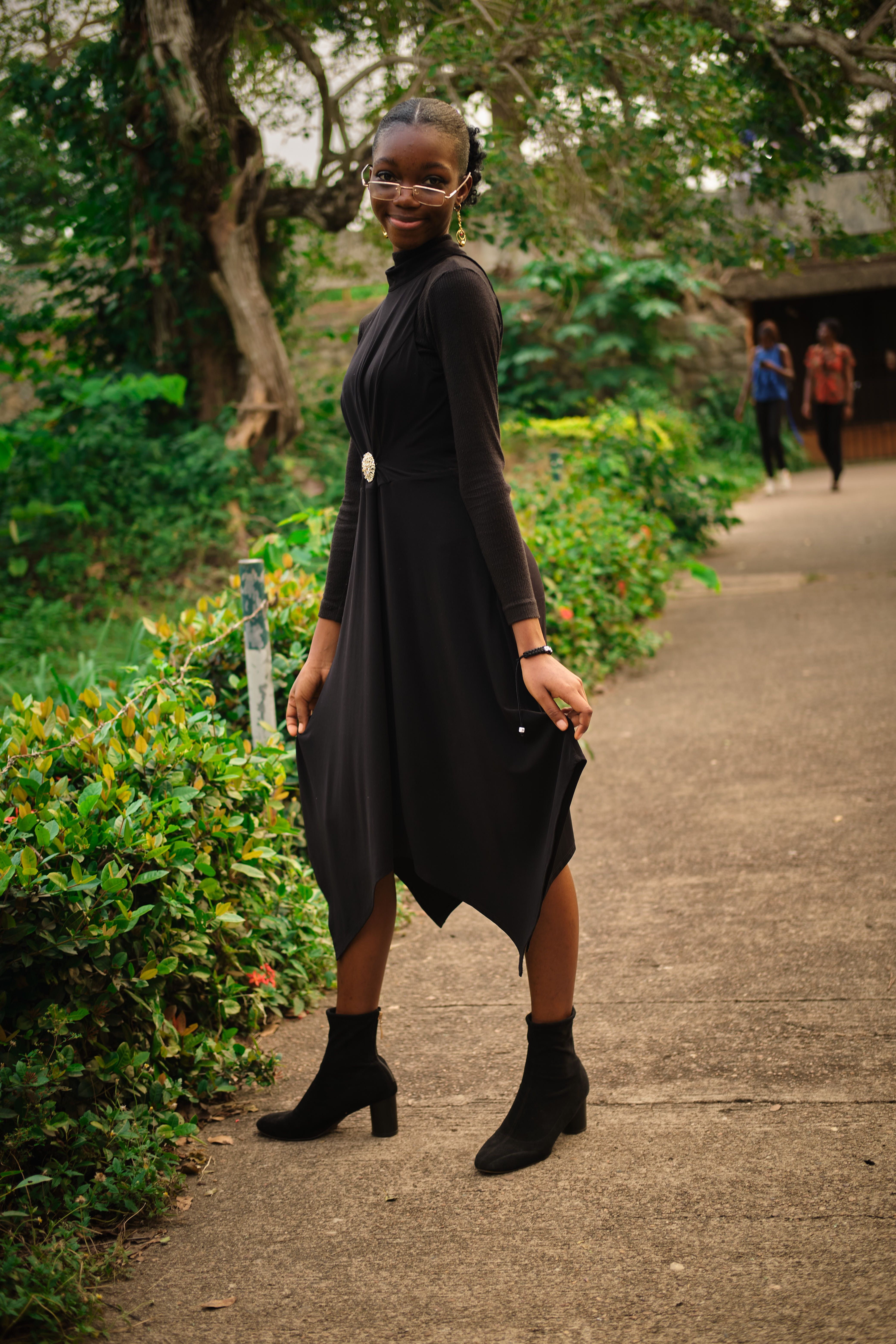 African Woman Wearing Black Dress in a Park · Free Stock Photo