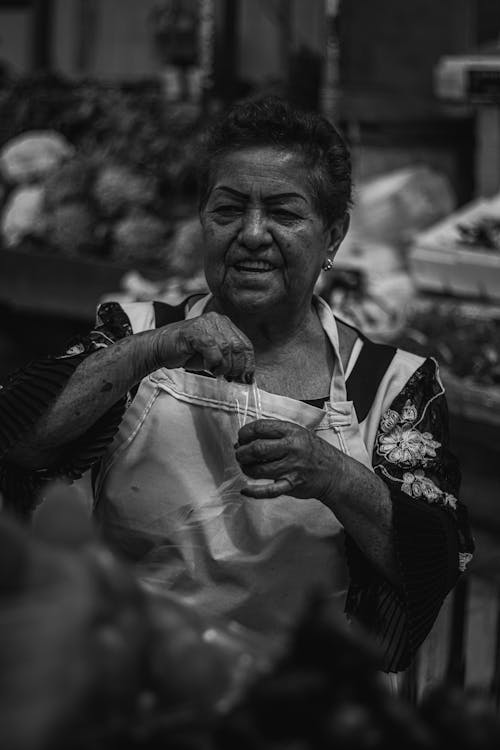 Woman Selling on Market