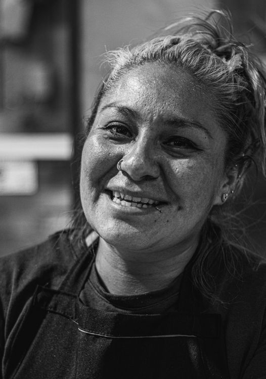 Black and White Portrait of a Smiling Woman · Free Stock Photo