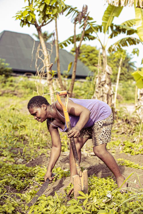 African Boy Working on Plantation 