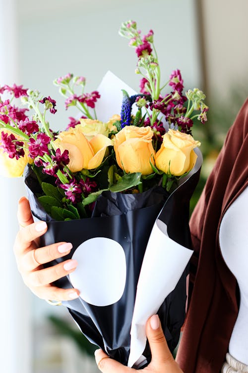 Close-up of Woman Holding a Bouquet 