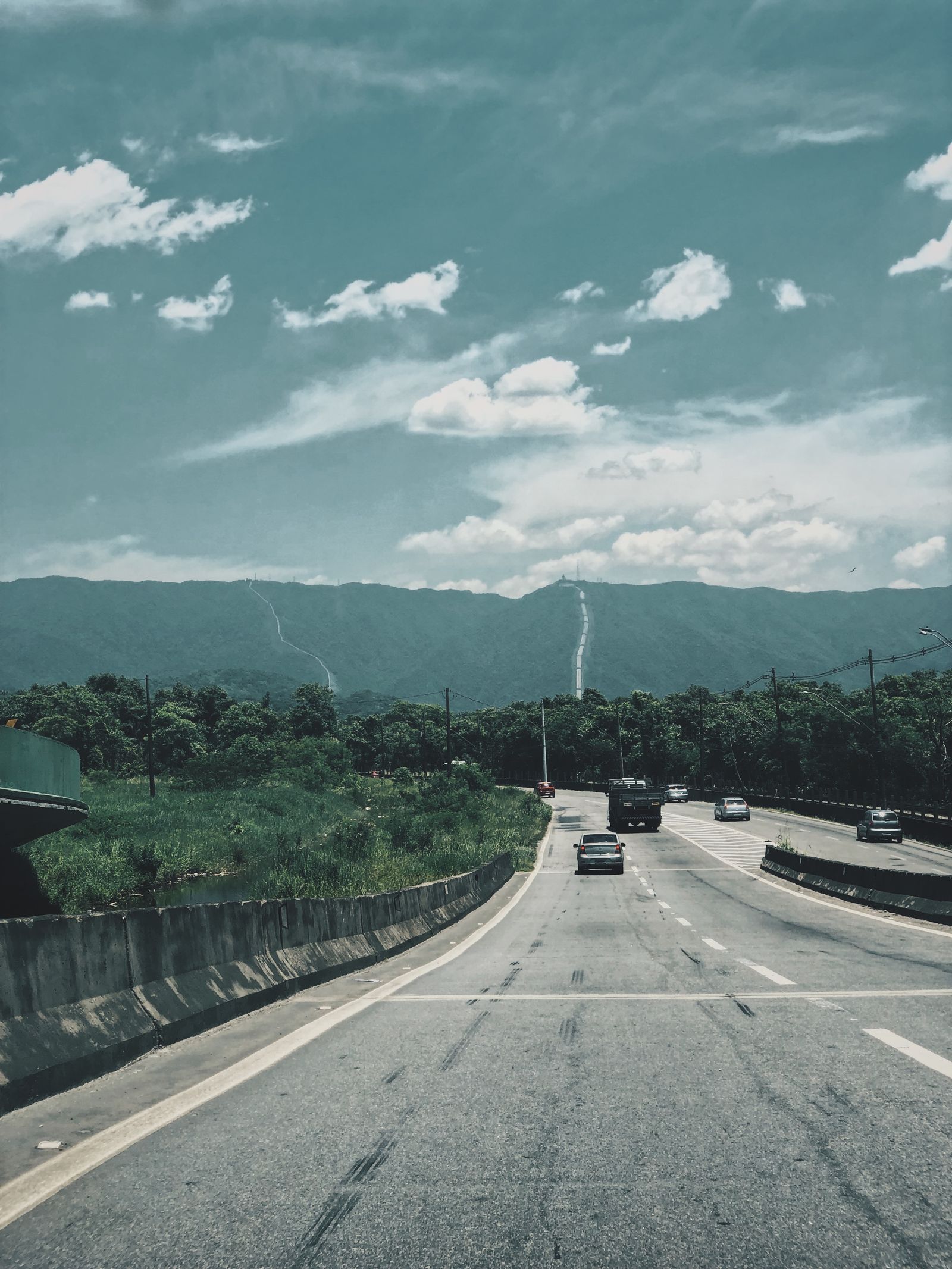 Highway through mountain scenery