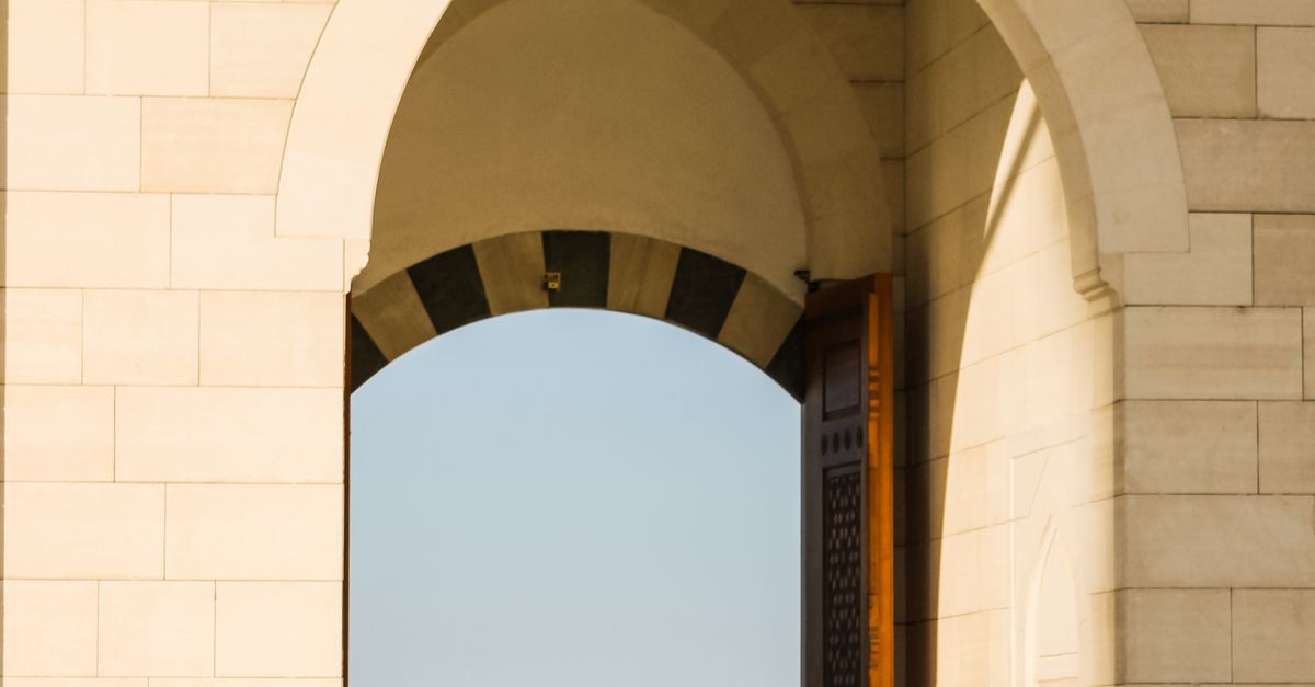 Photo of a Gate with an Arch · Free Stock Photo
