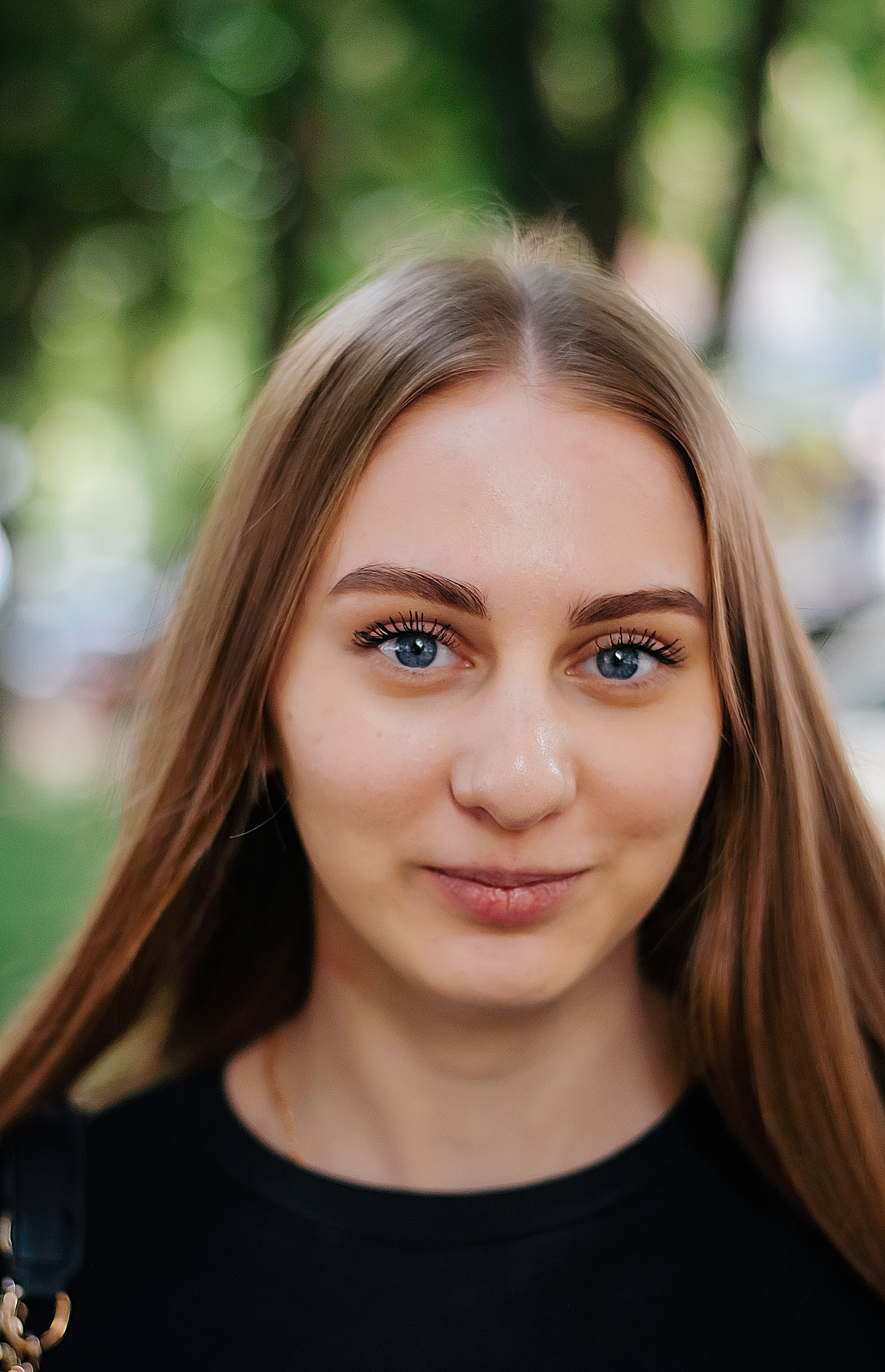 Portrait of a Young Woman with Straight Long Hair · Free Stock Photo