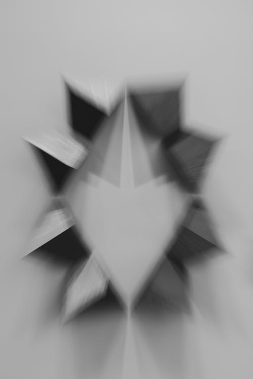 Blurred Origami on Grey Background