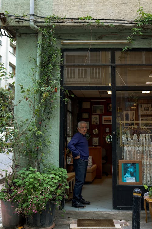 Man Standing in Door