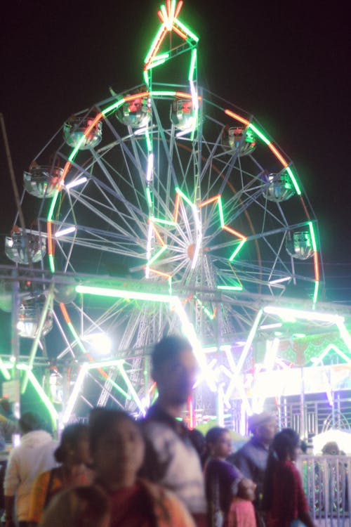 Free stock photo of blurred, ferris wheel, gathering