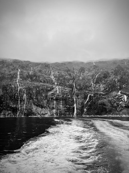 Amazing Cascade Flowing Down Fjord