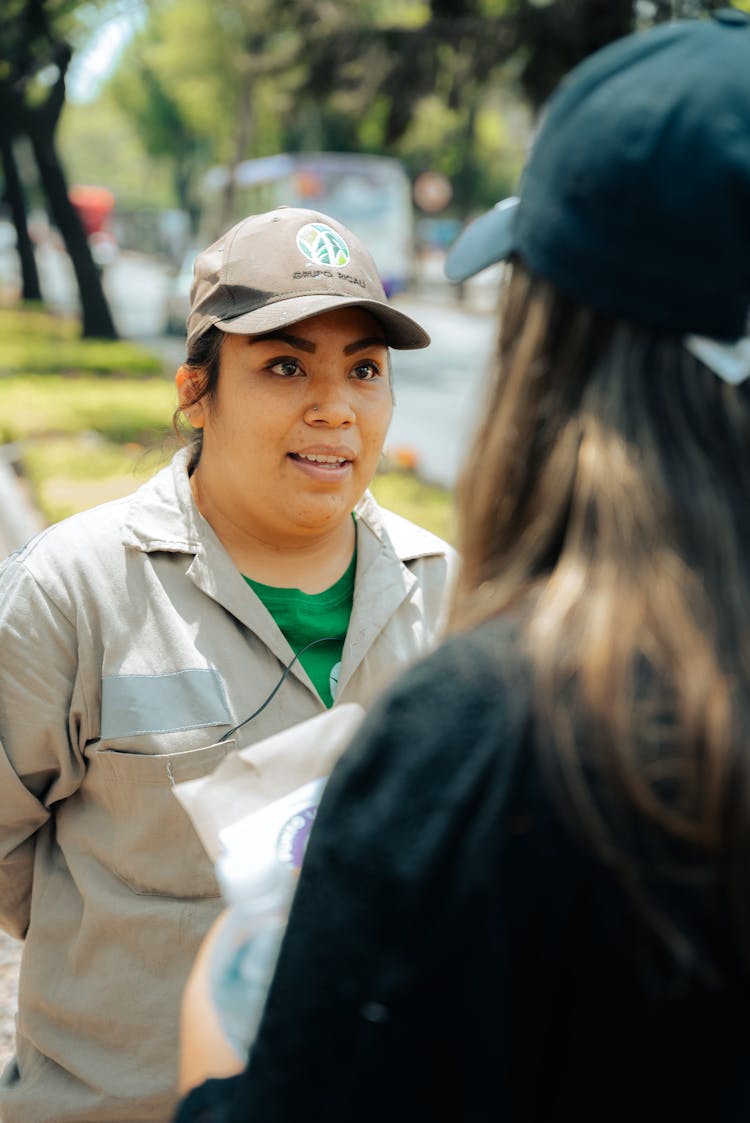 Woman In Cap Talking